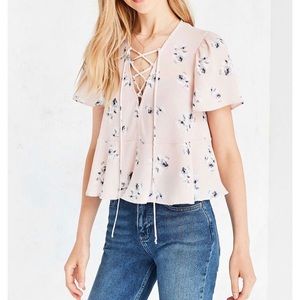 Urban Outfitters pink lace up short-sleeve blouse